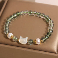 Bracelet porte-bonheur en forme de tête de chat en nacre fantôme verte authentique de KarmaRipple