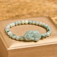 Bracelet de fortune sculpté PiXiu en jade vert authentique de KarmaRipple
