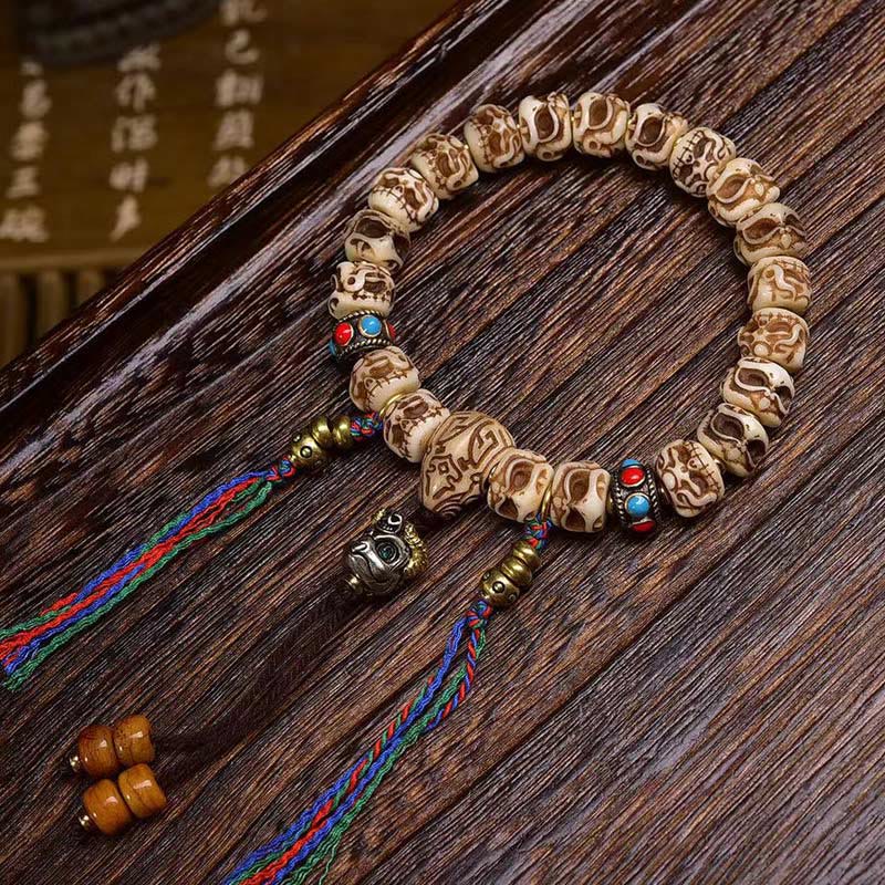 KarmaRipple's Tibetan Camel Bone Garuda Carved Protection Tassel Bracelet p12