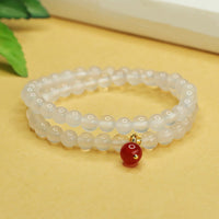 Bracelet double couche d'équilibre positif en perles d'agate rouge calcédoine authentiques de KarmaRipple