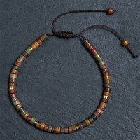 Bracelet de perles d'espacement en rhodonite pour l'équilibrage des relations de KarmaRipple