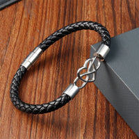 Bracelet à boucle robuste en acier titane et cuir à tissage infini de KarmaRipple