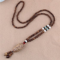 Collier avec pendentif en bois de wengé tibétain et agate Bodhi Seed de KarmaRipple, protection de l'éléphant