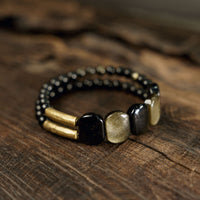 Bracelet renforcé en obsidienne noire et dorée de KarmaRipple