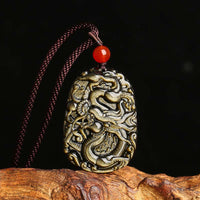 Collier pendentif à motif dragon en obsidienne dorée de KarmaRipple