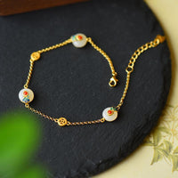 Bracelet en bronze et jade ivoire avec boucle de paix de KarmaRipple