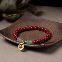 Bracelet porte-bonheur en aventurine verte cinabre de KarmaRipple