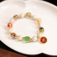 Bracelet Talisman Tibétain des Cinq Dieux de la Richesse et de la Fortune Liuli en Perles de Verre, Encens et Cendres en Porcelaine de KarmaRipple