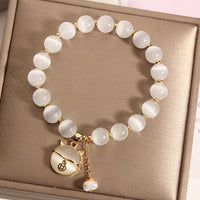 Bracelet Talisman d'Amour en Perles Motif Chat Œil de Chat de KarmaRipple