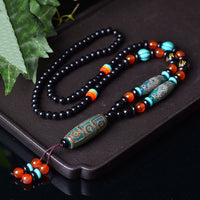 Collier avec pendentif de protection Om Mani Padme Hum en perles dzi tibétaines à neuf yeux de KarmaRipple, motif dragon