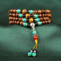 Bracelet d'équilibrage Mala en bois de rose et œil de tigre de 108 perles de KarmaRipple