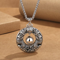 Collier pendentif de protection en bronze avec perles jouant au double dragon de KarmaRipple