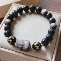 Bracelet de protection authentique en obsidienne argentée et noire Om Mani Padme Hum Pixiu de KarmaRipple