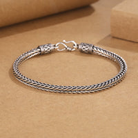 Bracelet à boucle de richesse tissé torsadé en forme de quille de dragon vintage de KarmaRipple