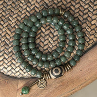 Bracelet triple tour en perles de Bodhi Dzi cyan de KarmaRipple, sagesse et paix