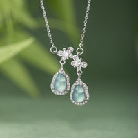 Collier avec pendentif papillon porte-bonheur en argent sterling 925 et jade vert double gourde de KarmaRipple