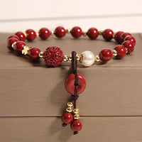 Bracelet de bénédiction en bronze avec boucle de paix en cinabre authentique de KarmaRipple