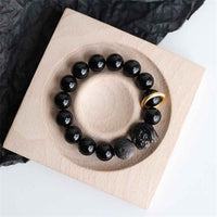 Bracelet Force du Lion en Obsidienne Noire et Argentée de KarmaRipple