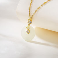 Collier avec pendentif en argent sterling 925 et jade ivoire Hetian de KarmaRipple, fleur, boucle de paix, porte-bonheur