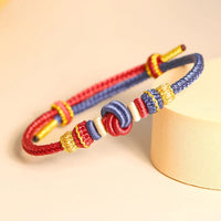 Bracelet de connexion de fortune tissé à huit fils en corde bicolore de KarmaRipple, fabriqué à la main