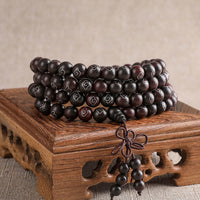 Bracelet de protection en argent sterling 925 incrusté de petites feuilles de bois de santal rouge de KarmaRipple, symbole Om Mani Padme Hum, nuages ​​de bon augure