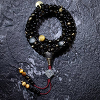 Bracelet de richesse en obsidienne dorée brillante, œil de tigre et œil d'aigle, 108 perles Mala de KarmaRipple