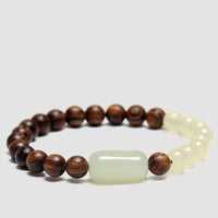 Bracelet d'abondance en jade et bois de santal de KarmaRipple