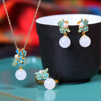 Collier et boucles d'oreilles avec pendentif en jade ivoire et argent sterling 925 de KarmaRipple, perle et fleur, avec pendentif et bague de bénédiction