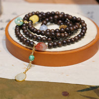 Bracelet de la paix en jade et bois d'agar de Brunei, ambre et agate rouge, 108 perles Mala de KarmaRipple