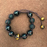 Bracelet d'équilibrage en pierre de lave et œil de tigre de KarmaRipple