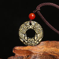 Collier avec pendentif en obsidienne dorée et boucle de paix en bronze Pixiu de KarmaRipple