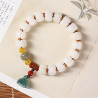 Bracelet de perles de citrouille gravées en agate rouge Bodhi Seed de KarmaRipple, authentique et équilibré