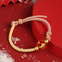 Bracelet à deux cordes bicolores gravées à la main sur le thème de la montagne et de la mer de KarmaRipple