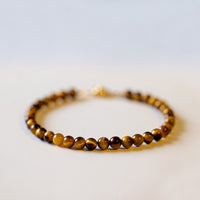 Bracelet de protection courageux en pierre œil de tigre authentique plaqué or 14 carats de KarmaRipple