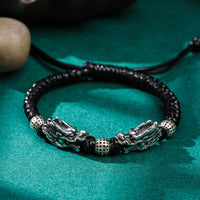 Bracelet tissé à la main en argent sterling 999 double dragon Fortune de KarmaRipple