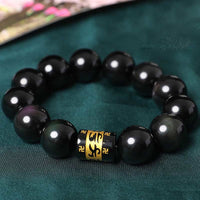 Bracelet Om Mani Padme Hum Swastika en obsidienne arc-en-ciel de KarmaRipple
