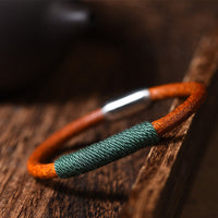 Bracelet en cuir tibétain fait main avec boucle en corde tressée et motif « cinq éléments » de KarmaRipple