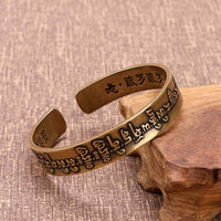 Bracelet de guérison tibétain en cuivre et laiton avec mantra sanskrit Mah¨¡pratisar¨¡ de KarmaRipple 
