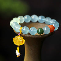 Bracelet de paix authentique en ambre aigue-marine et nœud chinois de KarmaRipple