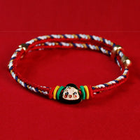 Bracelet fait main en corde colorée avec motif Zongzi et personnage Fu de KarmaRipple