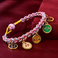 Bracelet tressé tibétain multicolore fait main de KarmaRipple, symbole des cinq dieux de la richesse
