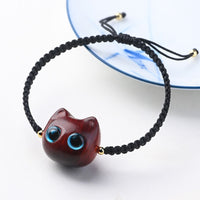 Bracelet tissé en bois de santal rouge et ébène à petites feuilles de KarmaRipple, tête de chat mignonne, calme et protection