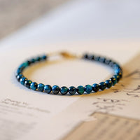 Bracelet de protection en pierre œil de tigre bleu authentique de KarmaRipple