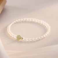 Bracelet de protection de la fortune en jade et agate ivoire authentique de KarmaRipple