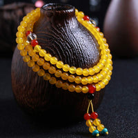 Bracelet d'équilibre en calcédoine jaune et perles de 108 Mala de KarmaRipple