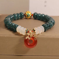Bracelet porte-bonheur en jade, ivoire, agate, agate rouge, boucle de paix, boulier, perles, de KarmaRipple