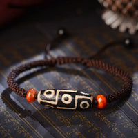 Bracelet de prospérité en perles dzi tibétaines à neuf yeux de KarmaRipple