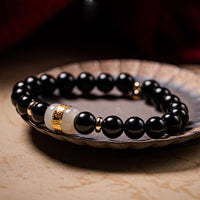 Bracelet magnétique en jade d'obsidienne noire Om Mani Padme Hum de KarmaRipple