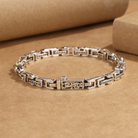 Bracelet de fortune et de succès en bronze gravé avec le dragon Om Mani Padme Hum de KarmaRipple