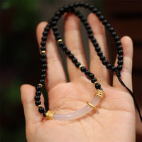 Collier avec pendentif en argent sterling 925 et perles de protection en onyx noir et calcédoine de KarmaRipple 